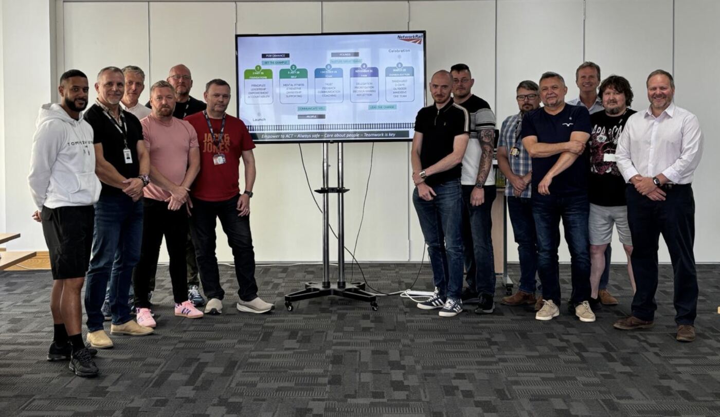 Professional leadership coaching session in a modern boardroom